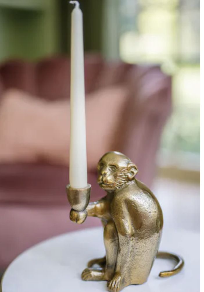 Der Affe Kerzenhalter